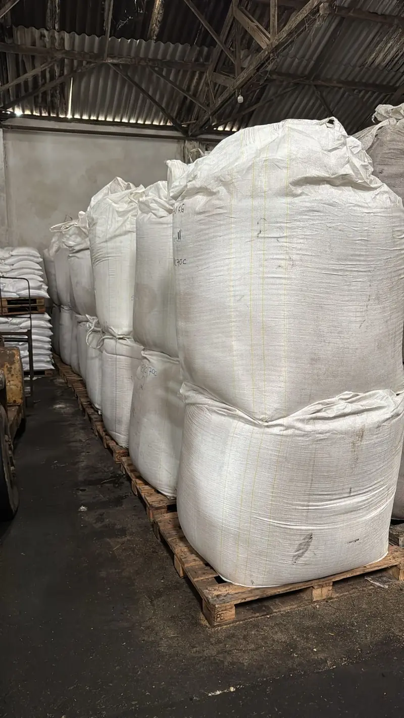 One-tonne big bags of sugar on pallets